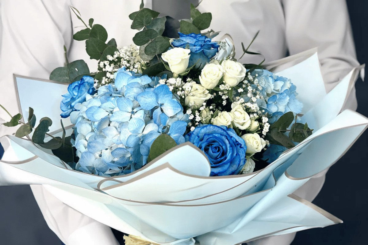 Elegant floral arrangement for corporate event by Tabrah Flowers 